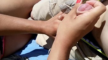 Girl Masturbates Boyfriend On A Public Beach